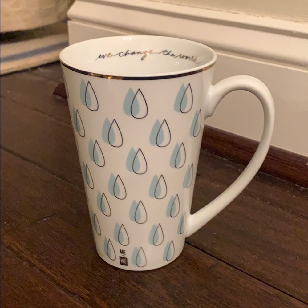 Me to We Tall Ceramic Mug “We Change the World”